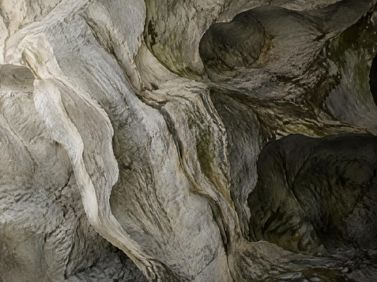 Layered limestone with natural moss-coloured mineral traces